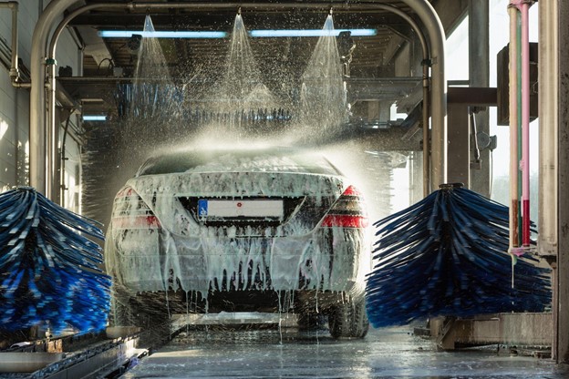 A Car Going Through a Self Service Car Wash
